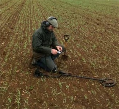 A member of the survey team at Stow A member of the survey team at Stow