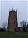 Evesham bell tower, which has bullet impact scars from fighting in the Civil War