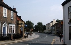 Great North Road in Boroughbridge town, leading north to the bridge.
