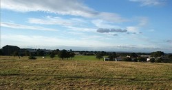 View from Moorside road, close to the probable initial royalist position on Hungar Hill. Looking north, down across the remaining area of Adwalton Moor within Drighlington village. Johnson (2003)argues that the enclosures for which the main action was fought lay where the houses stand on the north edge of the moor.